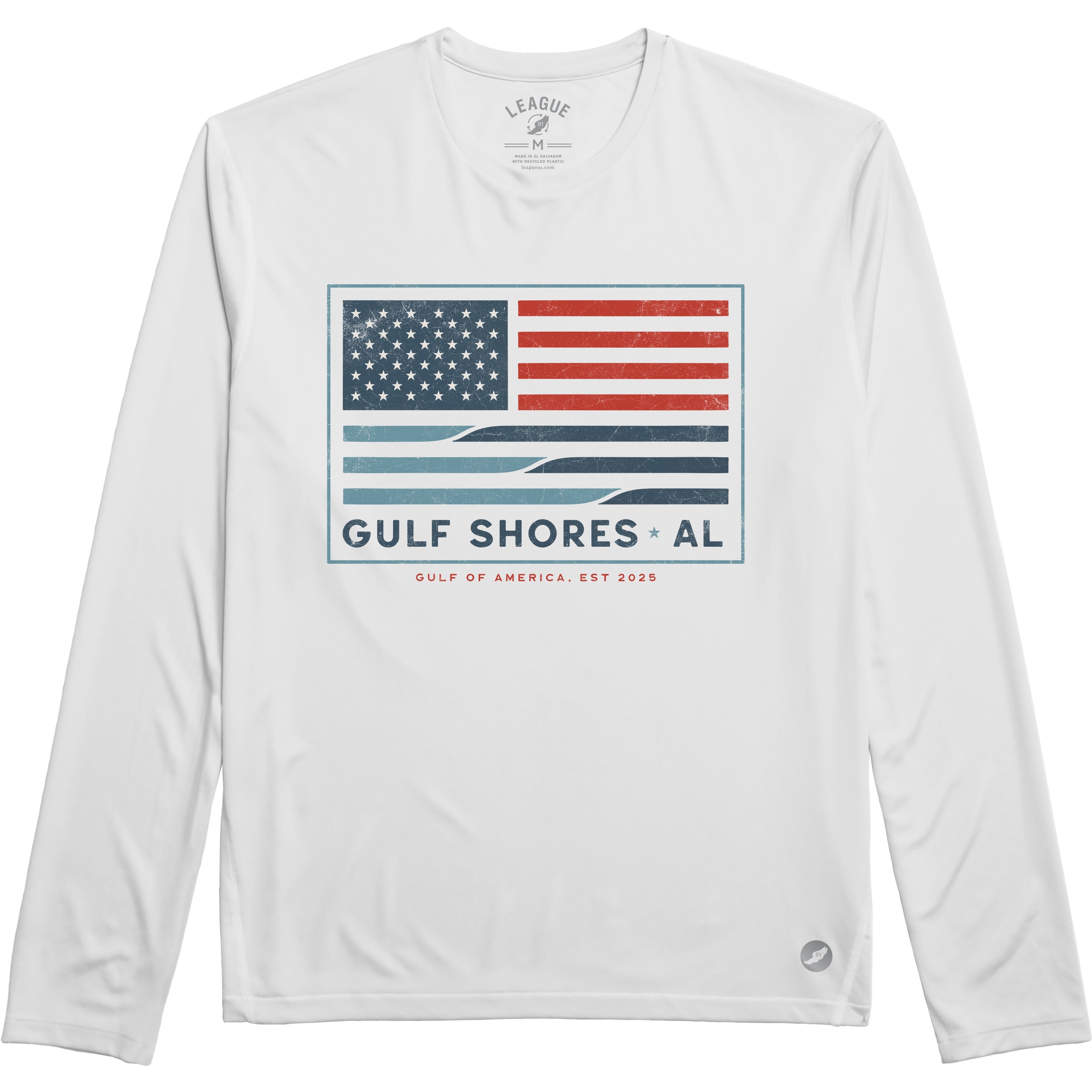 White long-sleeve shirt with American flag graphic and 'Gulf Shores, AL' and 'Gulf of America' text on a white background